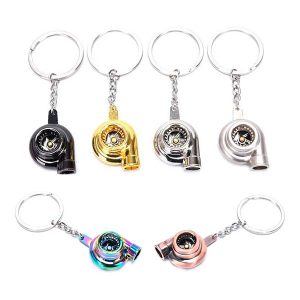llavero mini turbo metálico multicolor con diseño de turbocompresor para autos