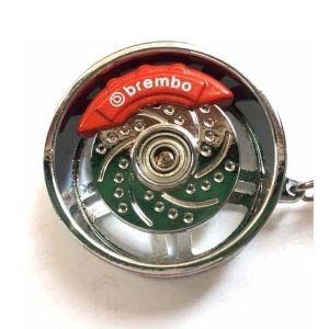 72. Llavero Llanta Multirayada con Disco de Freno ATRAS llavero metálico llanta multirayada con disco de freno giratorio en colores plata, dorado y negro